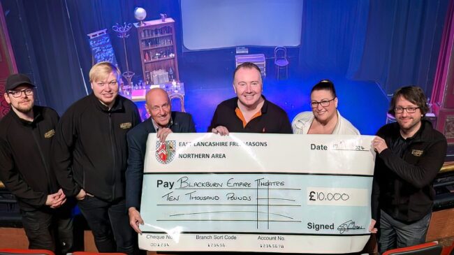 Pictured from left to right: Ryan Clegg (Blackburn Empire), Alex Pickup (Blackburn Empire), David Lightbrown, Simon Gilrane, Dawn Gilrane (East Lancashire Freemasons), and Kris Connell (Blackburn Empire), marking this important milestone for the theatre.