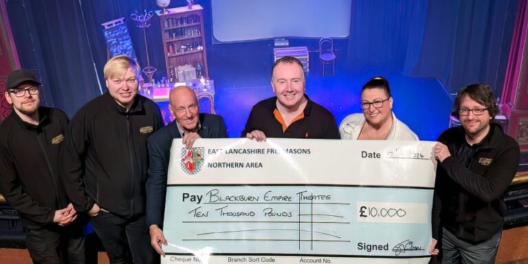 Donation from ELF Pictured from left to right: Ryan Clegg (Blackburn Empire), Alex Pickup (Blackburn Empire), David Lightbrown, Simon Gilrane, Dawn Gilrane (East Lancashire Freemasons), and Kris Connell (Blackburn Empire), marking this important milestone for the theatre.